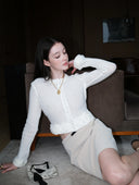 Mid-rise A-Line Buckle Skirt in Sandy Beige