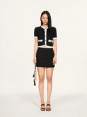 “Black & White Camellia” Knitted Short-Sleeve Cardigan with Hand-Crocheted Trim